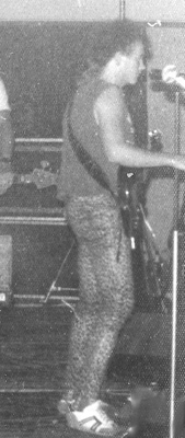 Vintage image of tom playing musik infront of an audience